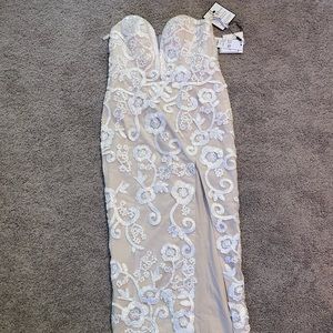 Women’s formal dress. Size 14 and never worn.